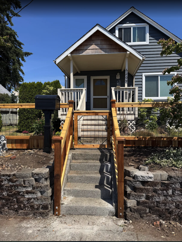 HOGWIRE FENCE, RAILINGS & DOUBLE-WIDE GATE — photo 1